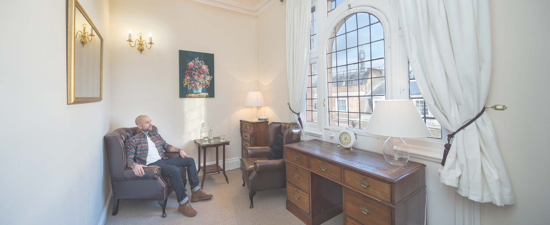 Jon Gee psychotherapist consulting room UK trauma therapy Deep Brain Reorienting sessions online